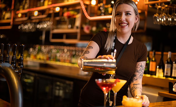 bar-staff-pouring-a-cocktail