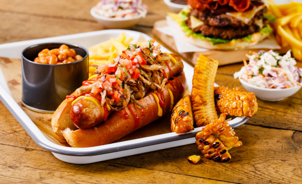 plate of hotdog and chips