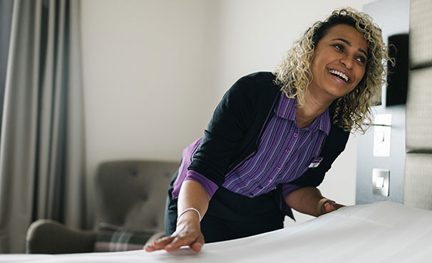 smiling-staff-making-the-bed