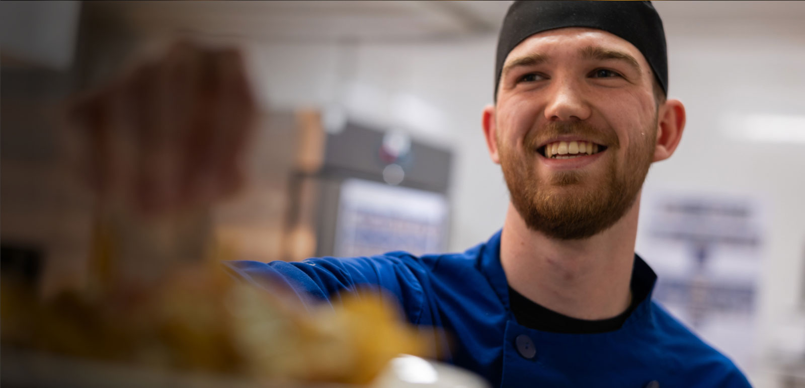 smiling kitchen staff